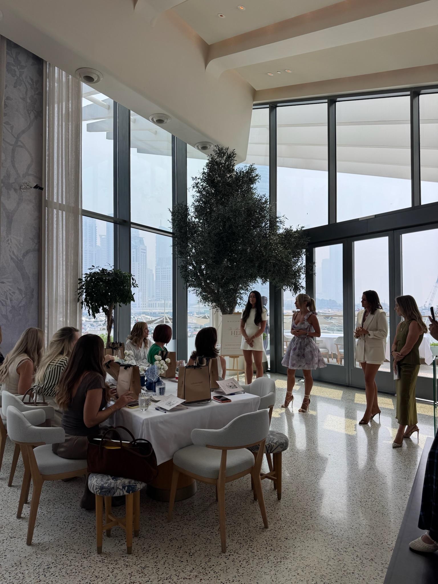 The House of Her workshop room with founders around the table